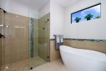Master bathroom with soaking tub and walk in shower